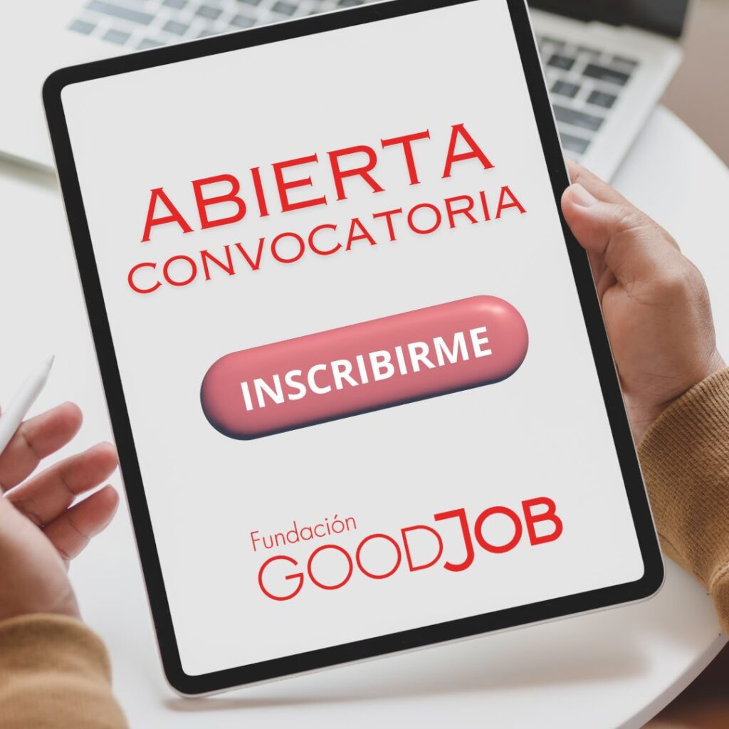 Pantalla de tablet mostrando una convocatoria abierta de Fundación GoodJob con un botón rosa que dice 'INSCRIBIRME'. El texto 'ABIERTA CONVOCATORIA' aparece en rojo en la parte superior.